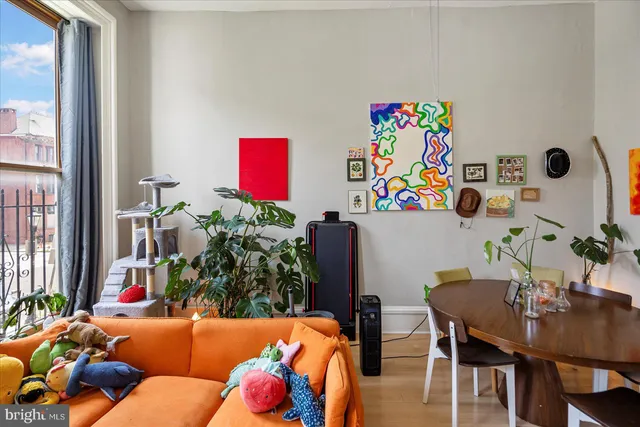 a kitchen with a stove and a refrigerator