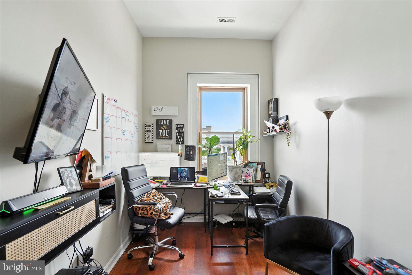 2304 Eutaw Place Baltimore, MD 21217 - Photo 89 of 105 a view of a workspace with furniture and a window