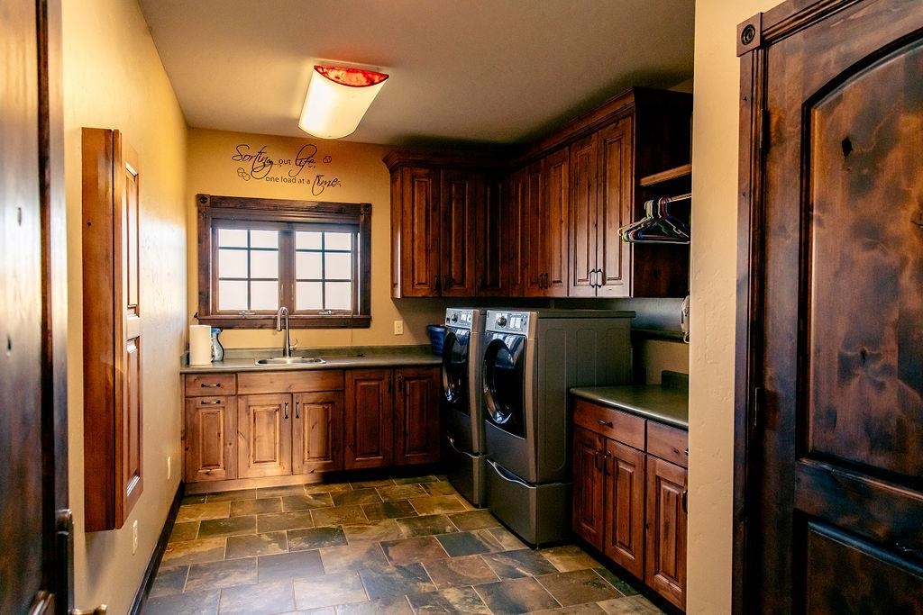 1230 Ridgeview Rangely, CO 81648 - Photo 17 of 42 a kitchen with stainless steel appliances granite countertop a refrigerator and a stove
