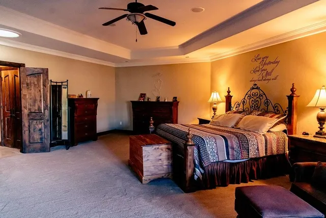 a bed room with a bed and a walk in closet