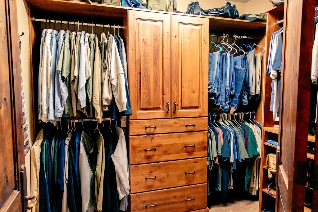 1230 Ridgeview Rangely, CO 81648 - Photo 22 of 42 a view of walk in closet with clothes and shoes