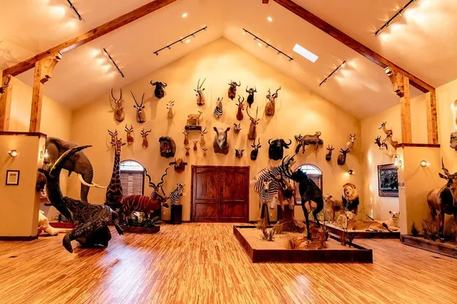 a view of gym equipment and front view of retail shop