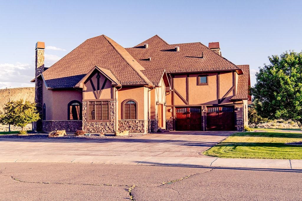 1230 Ridgeview Rangely, CO 81648 - Photo 5 of 42 front view of a house with a small yard