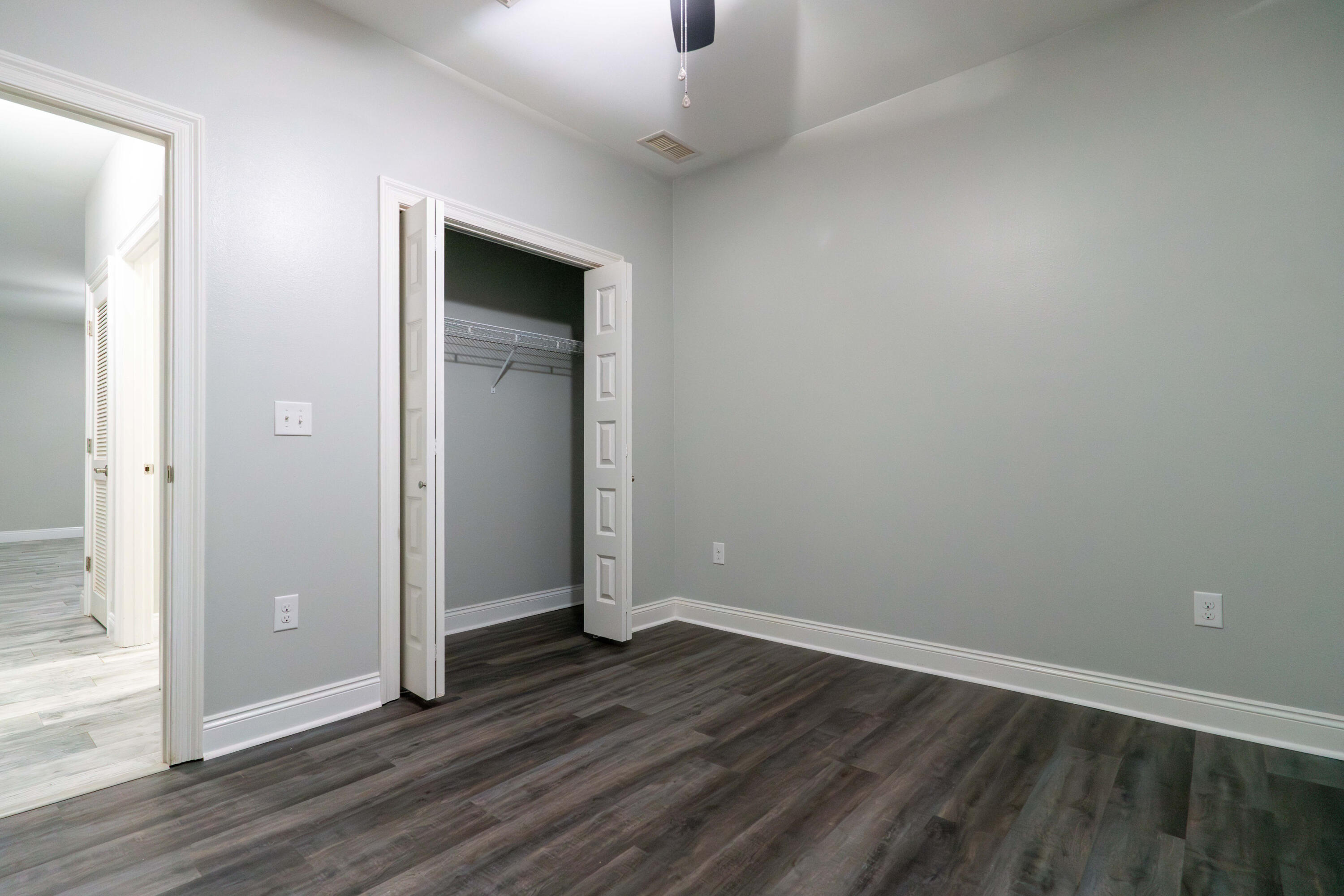 2243 Wind Trace Road North Navarre, FL 32566 - Photo 27 of 34 wooden floor in an empty room