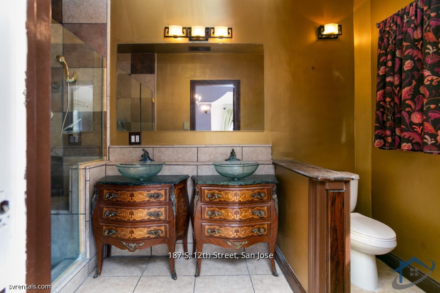 187 South 12th Street, Unit 2 San Jose, CA 95112 - Photo 14 of 24 a bathroom with a sink and a mirror
