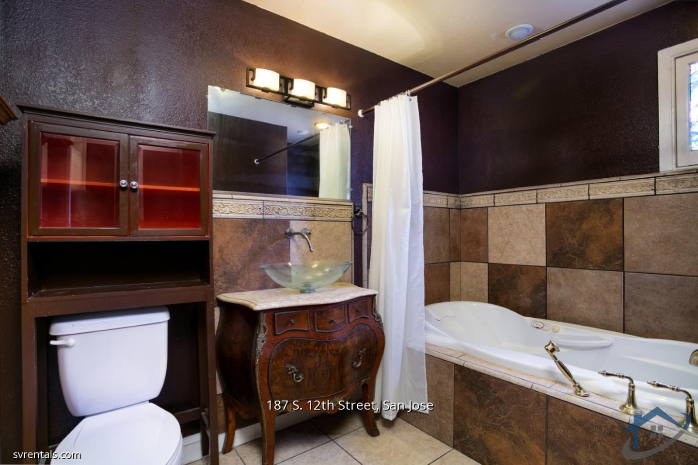 187 South 12th Street, Unit 2 San Jose, CA 95112 - Photo 20 of 24 a bathroom with a toilet a sink and bathtub