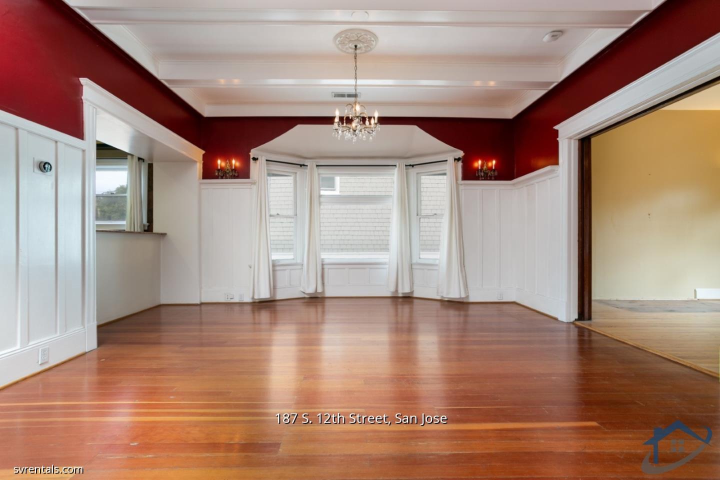 187 South 12th Street, Unit 2 San Jose, CA 95112 - Photo 6 of 24 a view of an empty room with window and wooden floor
