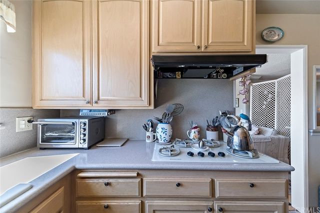 a bathroom with a sink a vanity and a mirror