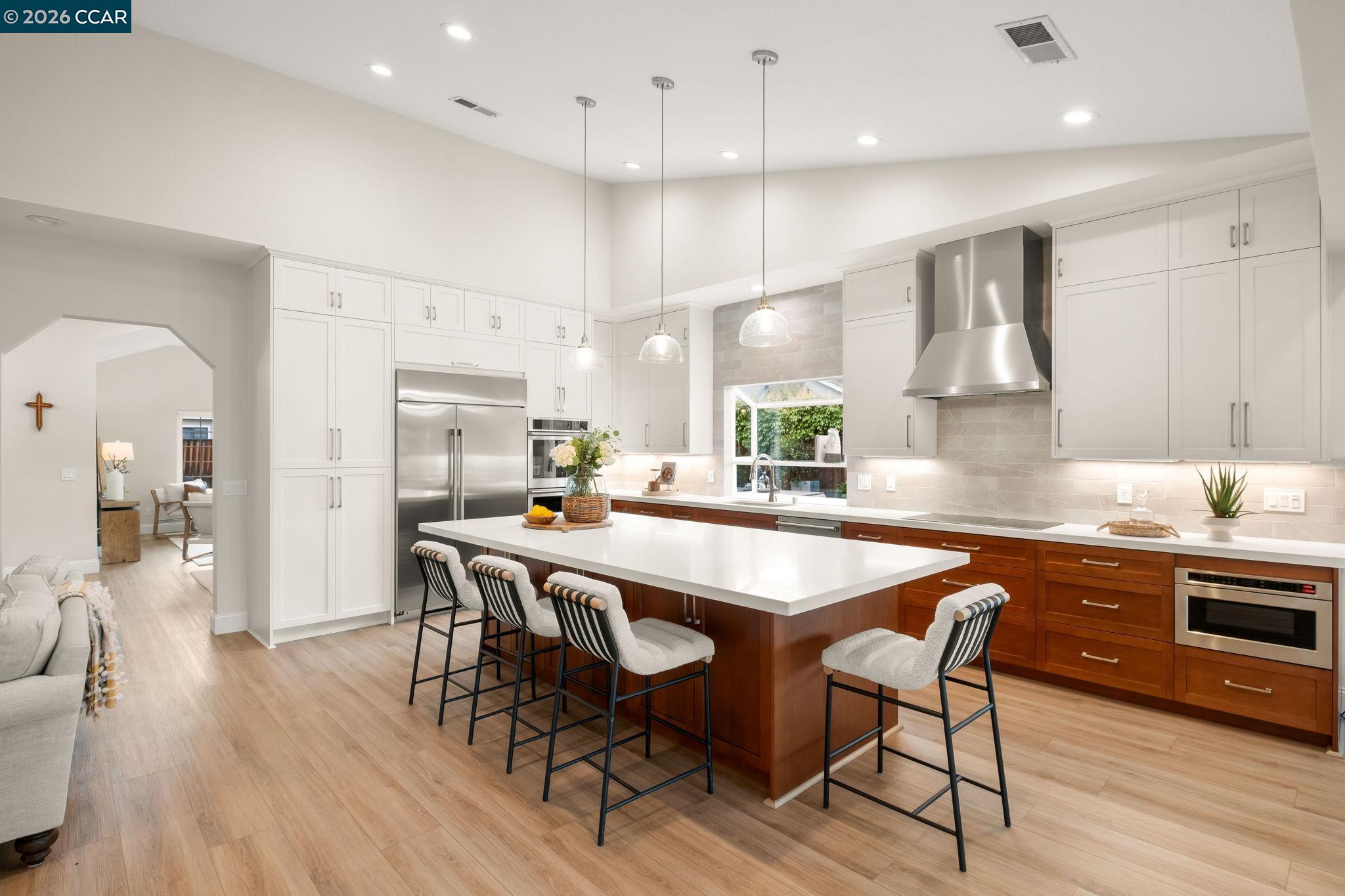 76 Rock Ridge Court Danville, CA 94526 - Photo 18 of 65 a large kitchen with a table and chairs