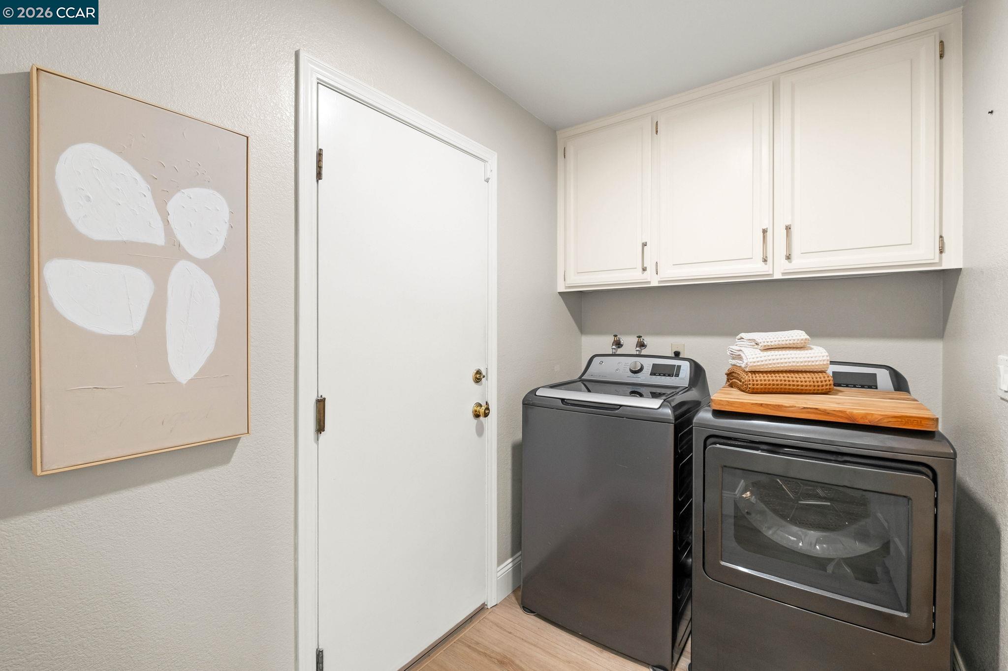 76 Rock Ridge Court Danville, CA 94526 - Photo 32 of 65 a kitchen with stainless steel appliances granite countertop a refrigerator and a stove