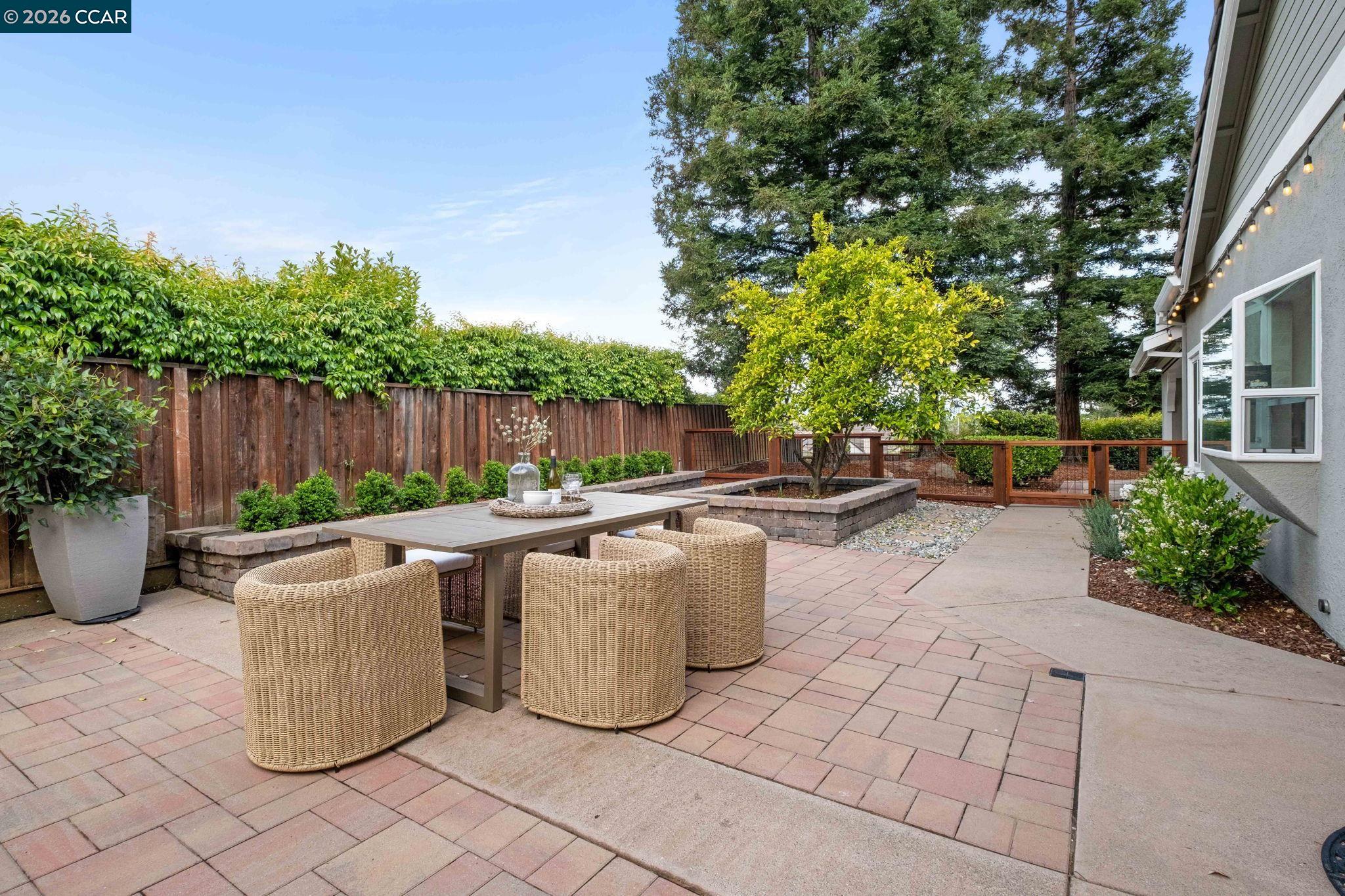 76 Rock Ridge Court Danville, CA 94526 - Photo 45 of 65 a view of a patio with table and chairs