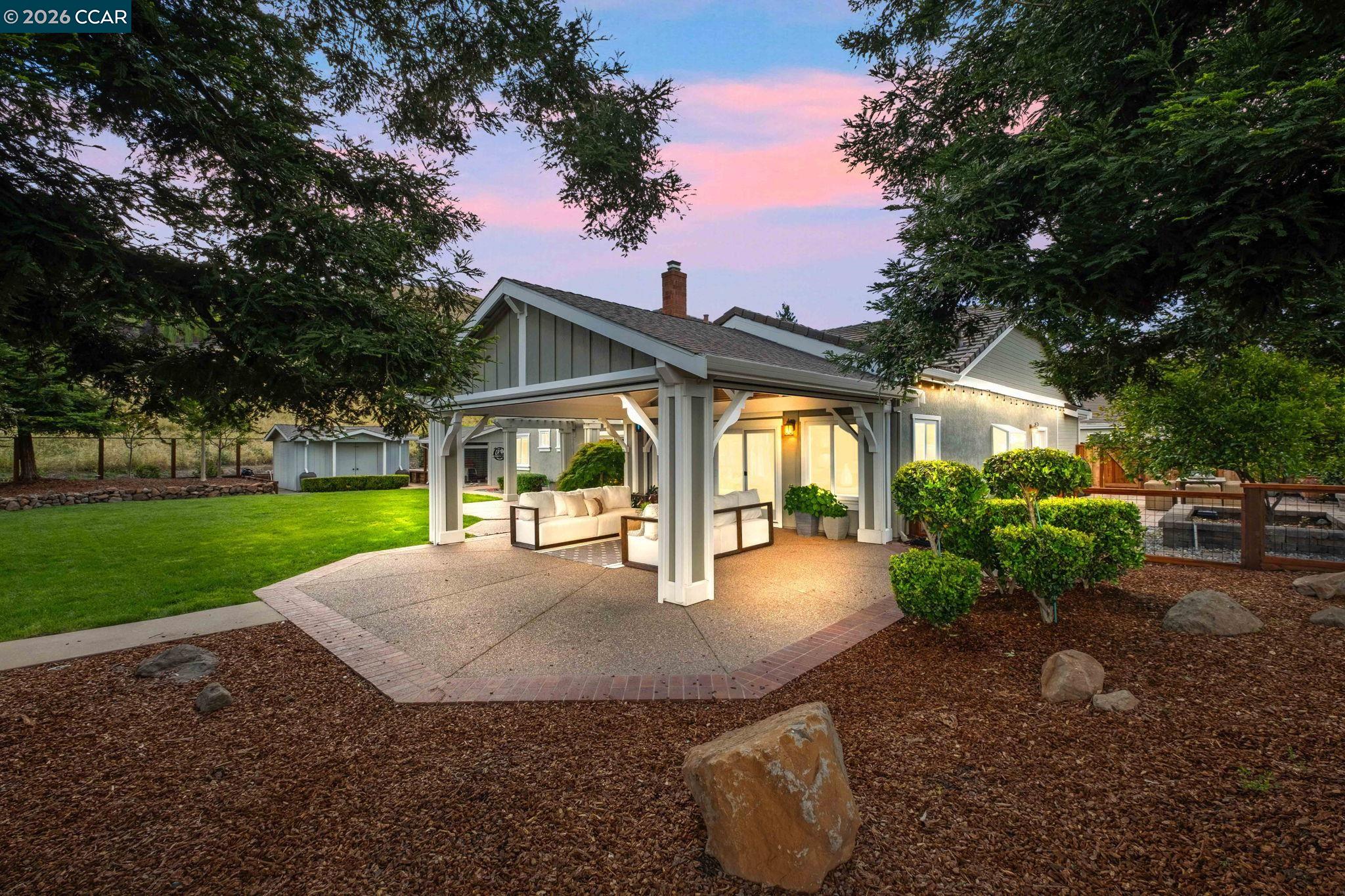 76 Rock Ridge Court Danville, CA 94526 - Photo 51 of 65 a view of a house with backyard porch and sitting area
