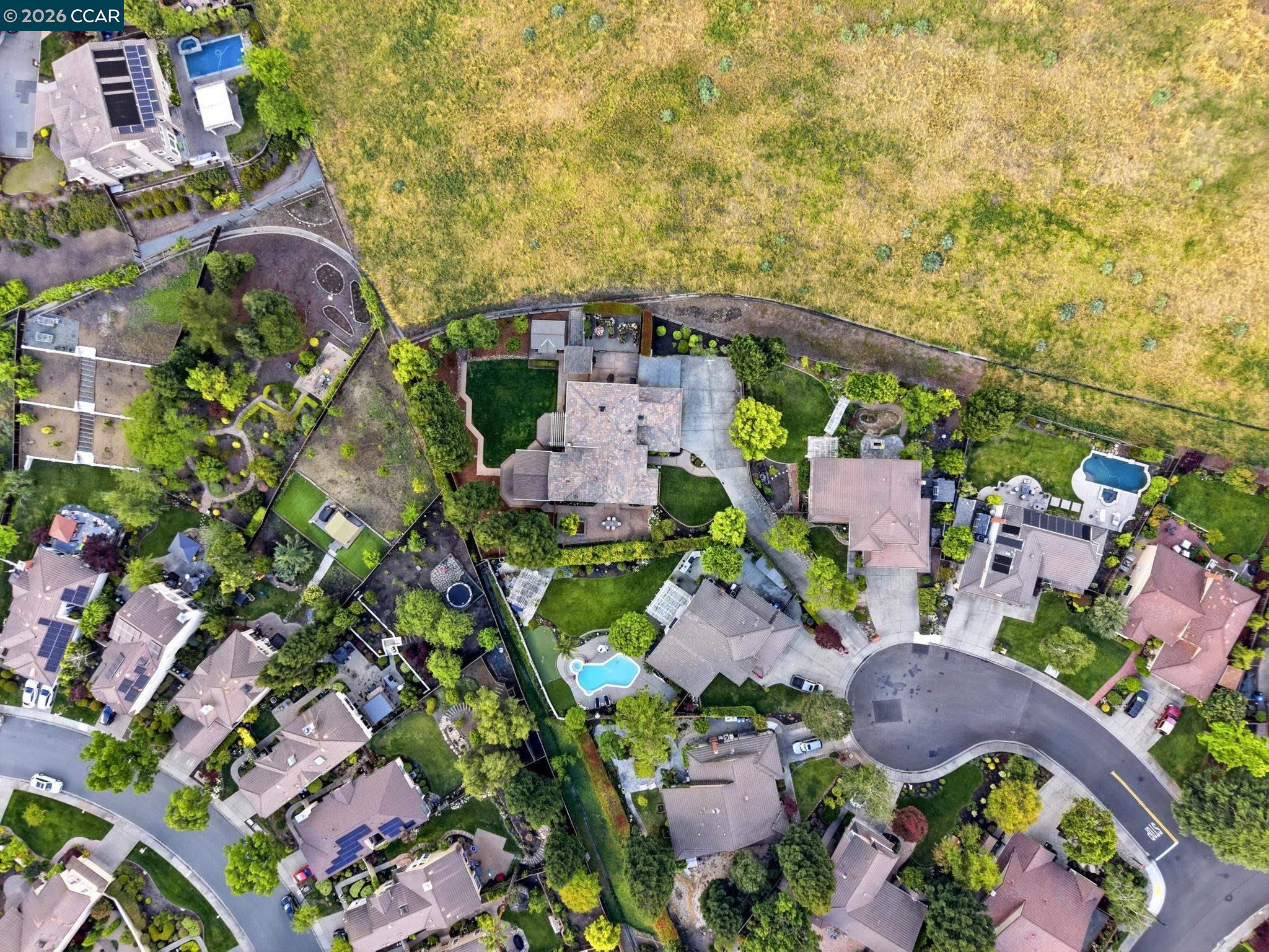 76 Rock Ridge Court Danville, CA 94526 - Photo 64 of 65 an aerial view of a house with a yard