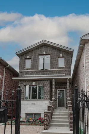 a front view of a house with a garage