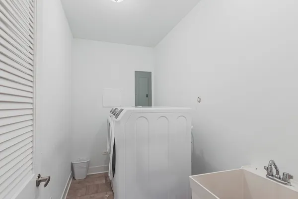 a bathroom with a sink and toilet
