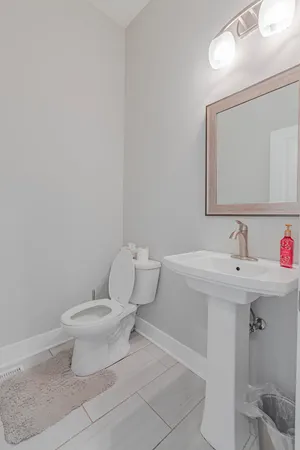 a bathroom with a sink and a toilet