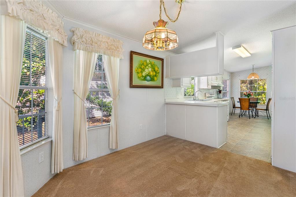 509 Starboard Avenue Edgewater, FL 32141 - Photo 11 of 54 a view of a room that has a bed and a window in it