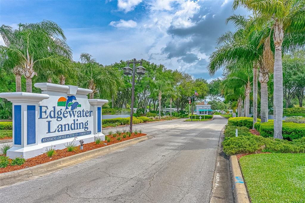 509 Starboard Avenue Edgewater, FL 32141 - Photo 2 of 54 a sign on the side of a building