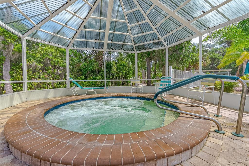509 Starboard Avenue Edgewater, FL 32141 - Photo 45 of 54 a view of a swimming pool with a porch