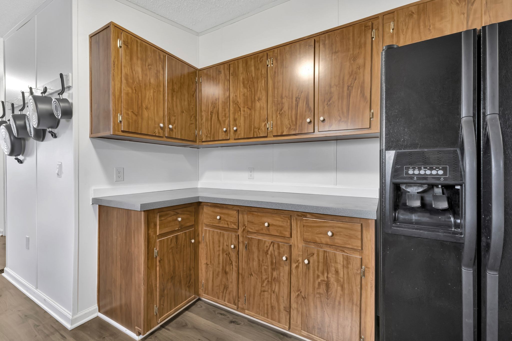 9440 Missionary Ridge Road Bon Aqua, TN 37025 - Photo 12 of 59 a view of a storage and utility room with wooden floor