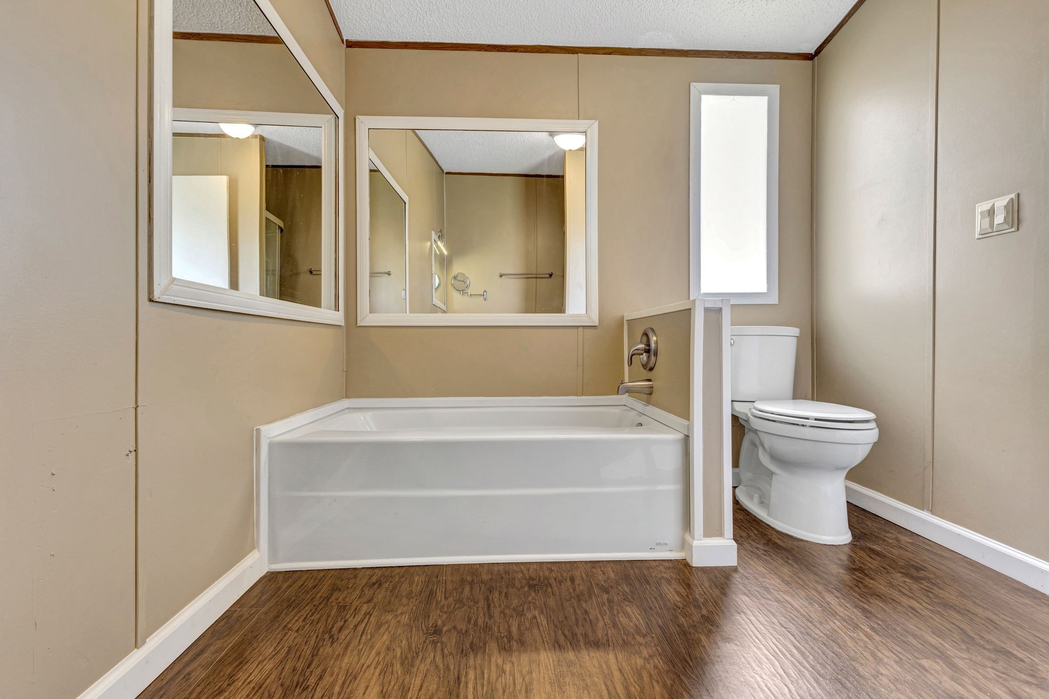 9440 Missionary Ridge Road Bon Aqua, TN 37025 - Photo 26 of 59 a bathroom with a bathtub and a toilet