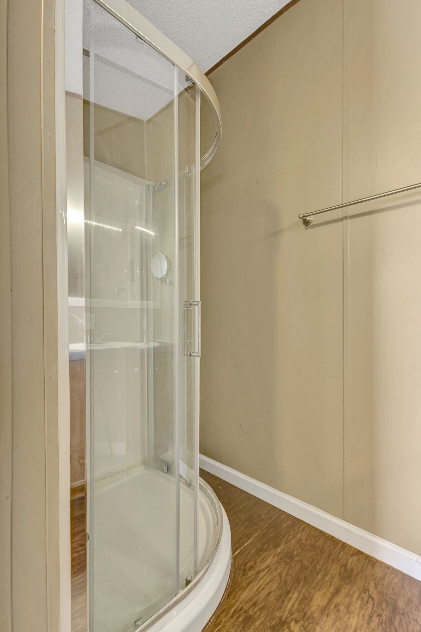 9440 Missionary Ridge Road Bon Aqua, TN 37025 - Photo 27 of 59 a bathroom with a glass shower door