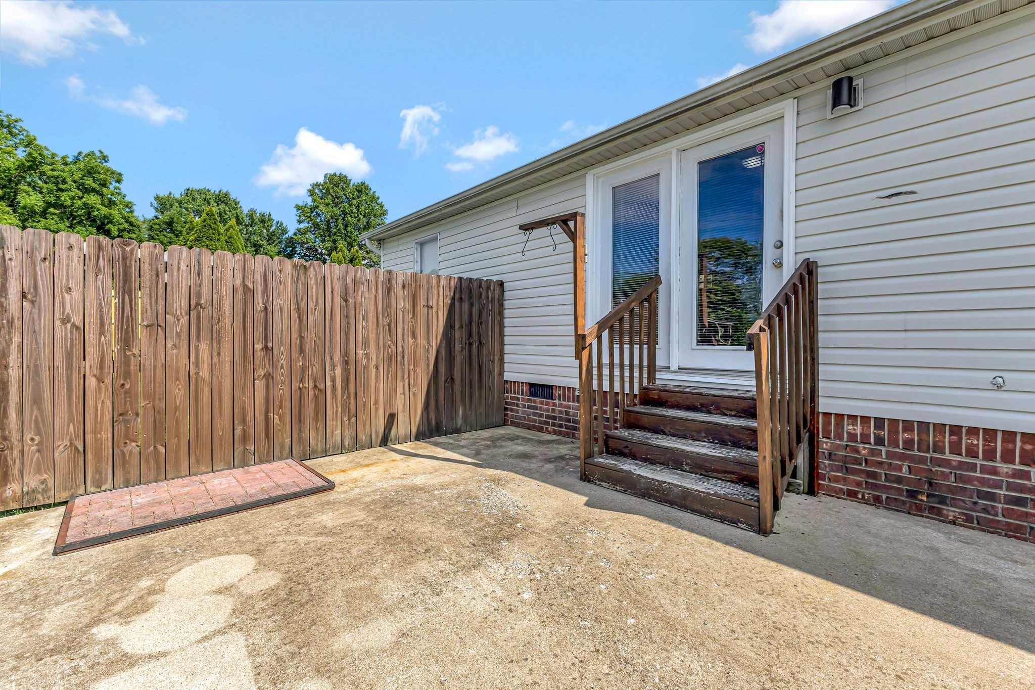 9440 Missionary Ridge Road Bon Aqua, TN 37025 - Photo 37 of 59 a view of a backyard with wooden fence and a stairs