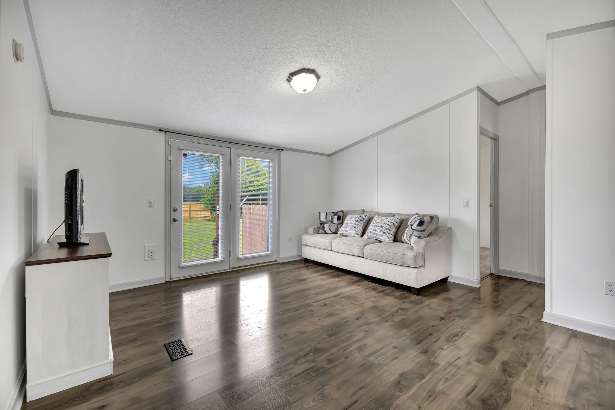 9440 Missionary Ridge Road Bon Aqua, TN 37025 - Photo 4 of 59 a living room with furniture and a flat screen tv