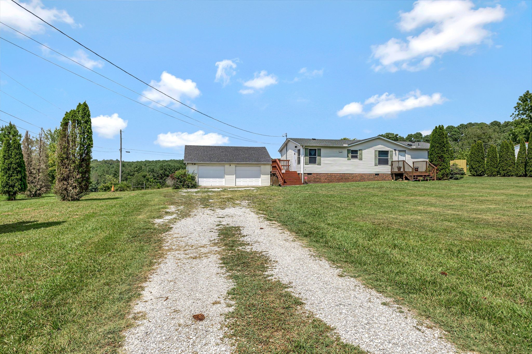9440 Missionary Ridge Road Bon Aqua, TN 37025 - Photo 42 of 59 a view of a big yard with a house
