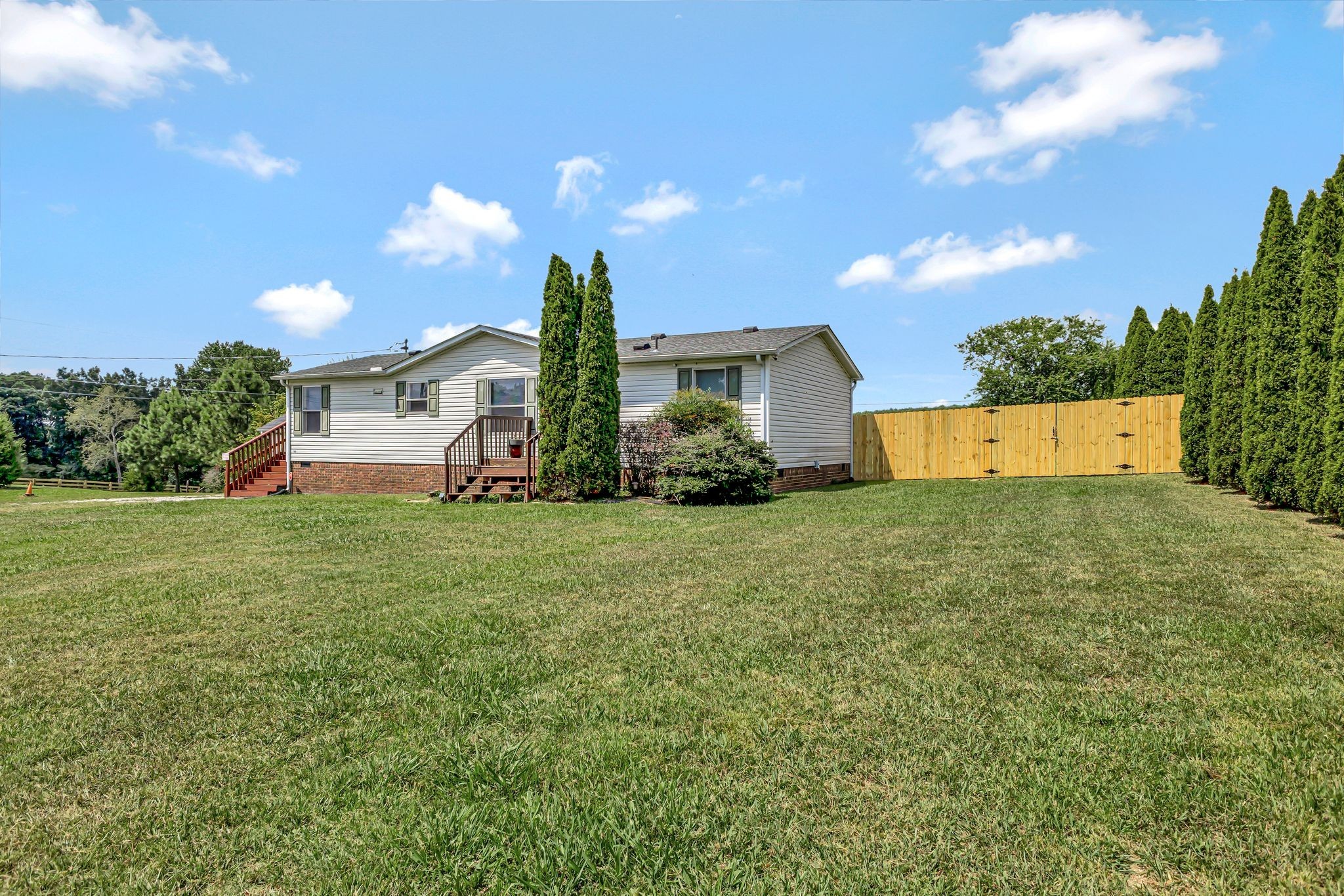 9440 Missionary Ridge Road Bon Aqua, TN 37025 - Photo 44 of 59 a front view of a house with garden
