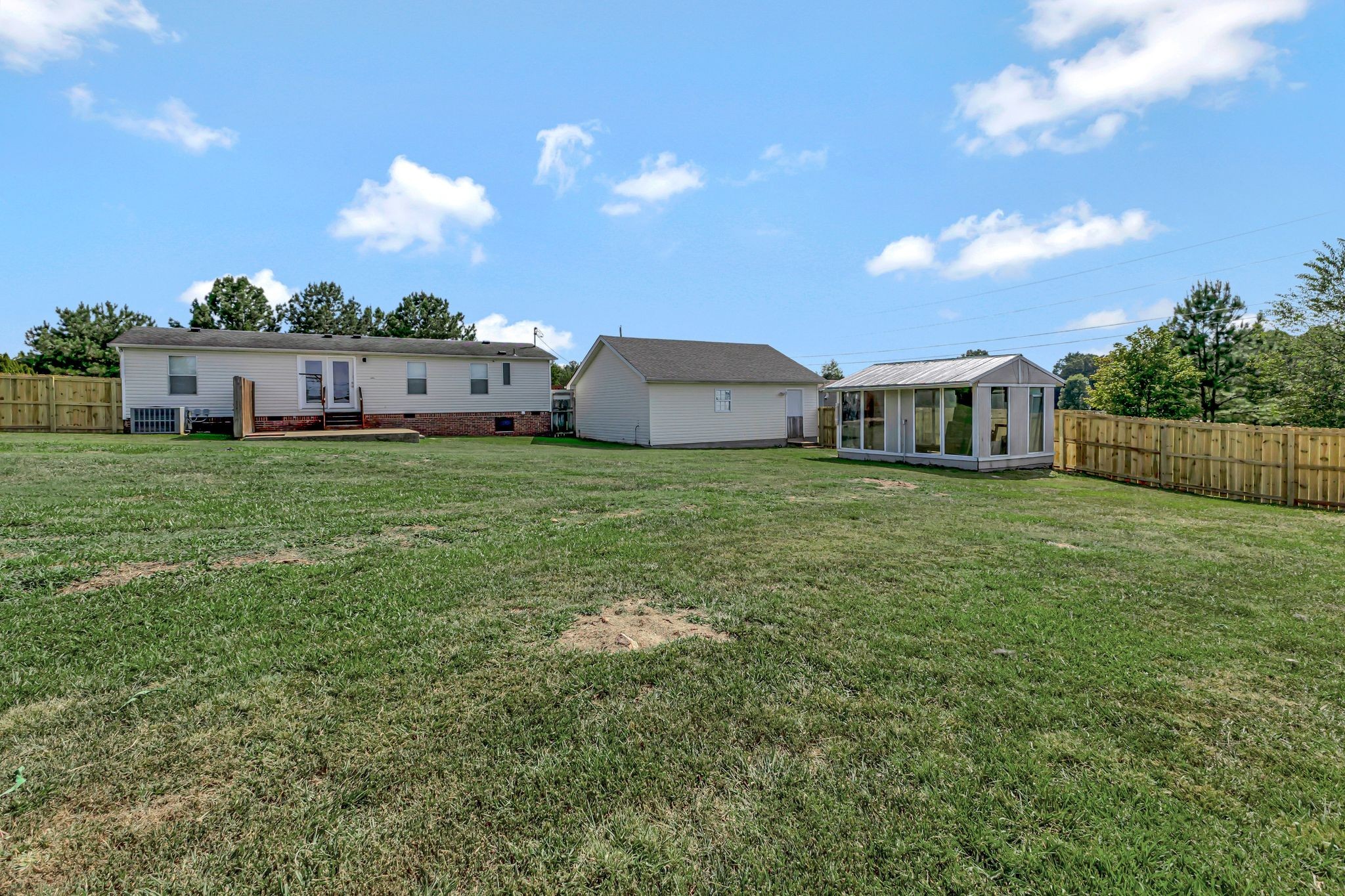 9440 Missionary Ridge Road Bon Aqua, TN 37025 - Photo 47 of 59 a view of a house with a big yard and large trees