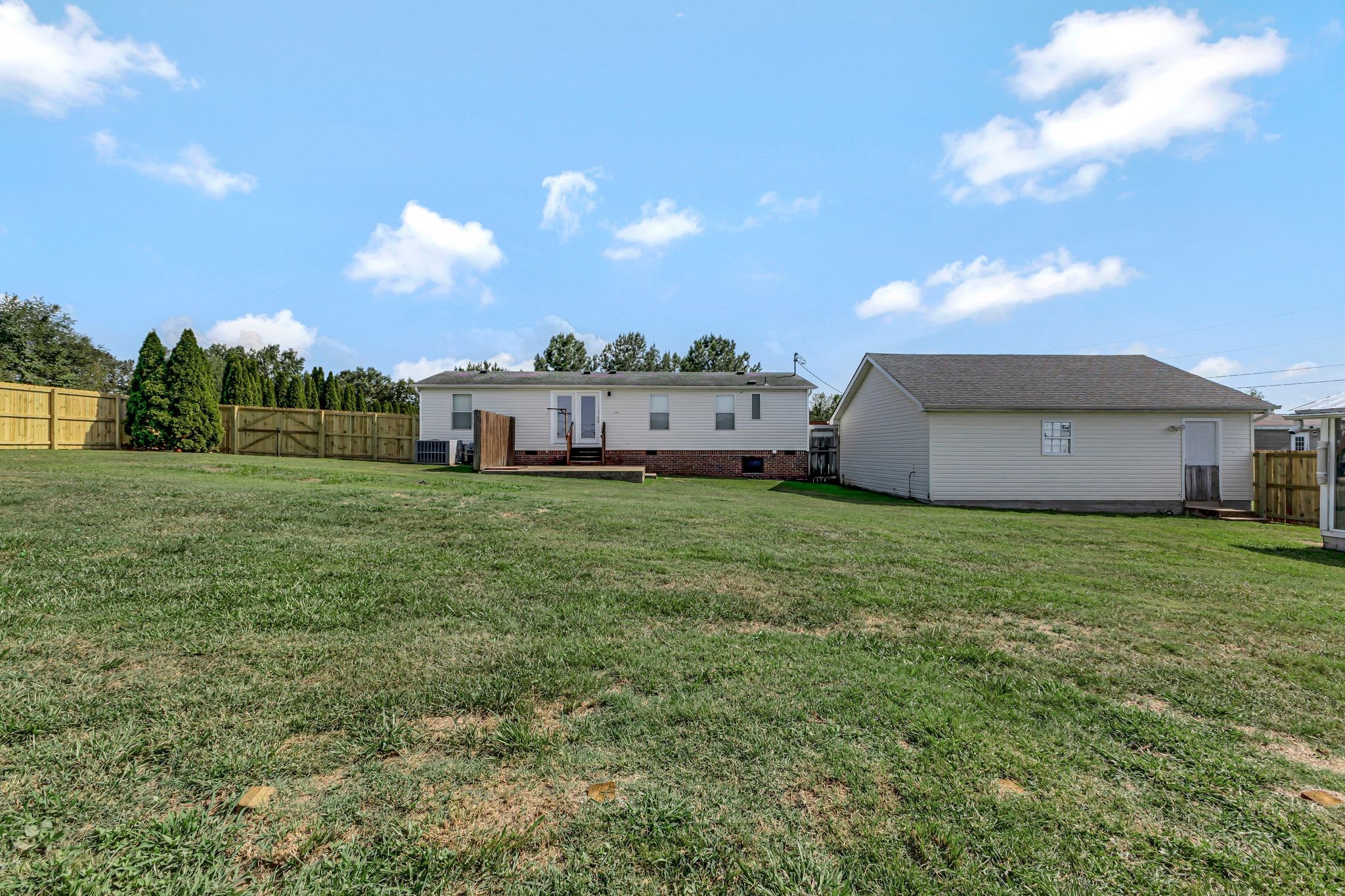 9440 Missionary Ridge Road Bon Aqua, TN 37025 - Photo 52 of 59 a view of a back yard of the house