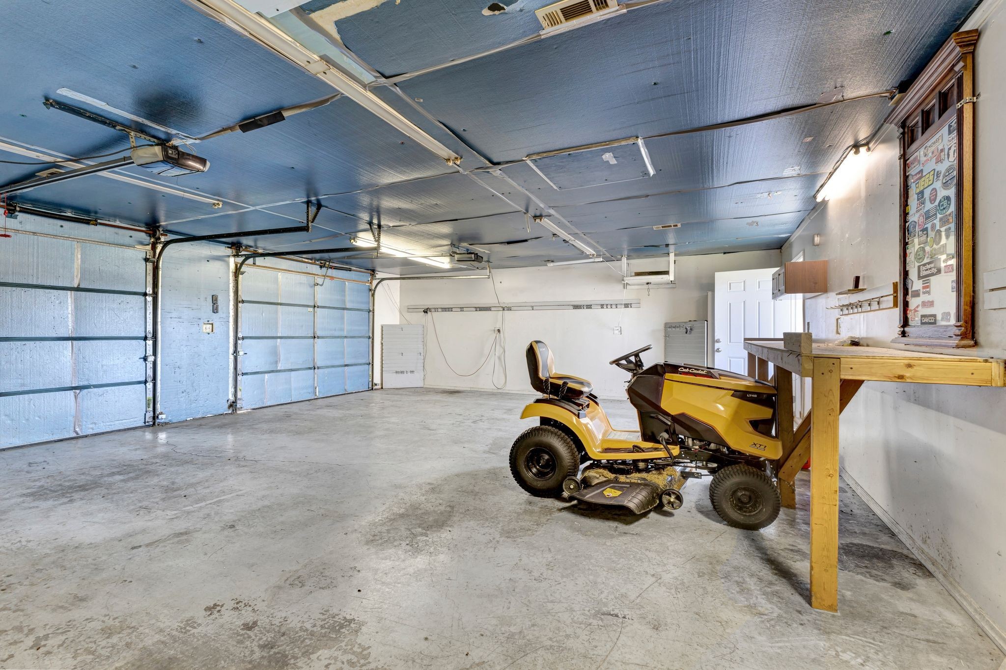 9440 Missionary Ridge Road Bon Aqua, TN 37025 - Photo 57 of 59 a view of a garage with chairs