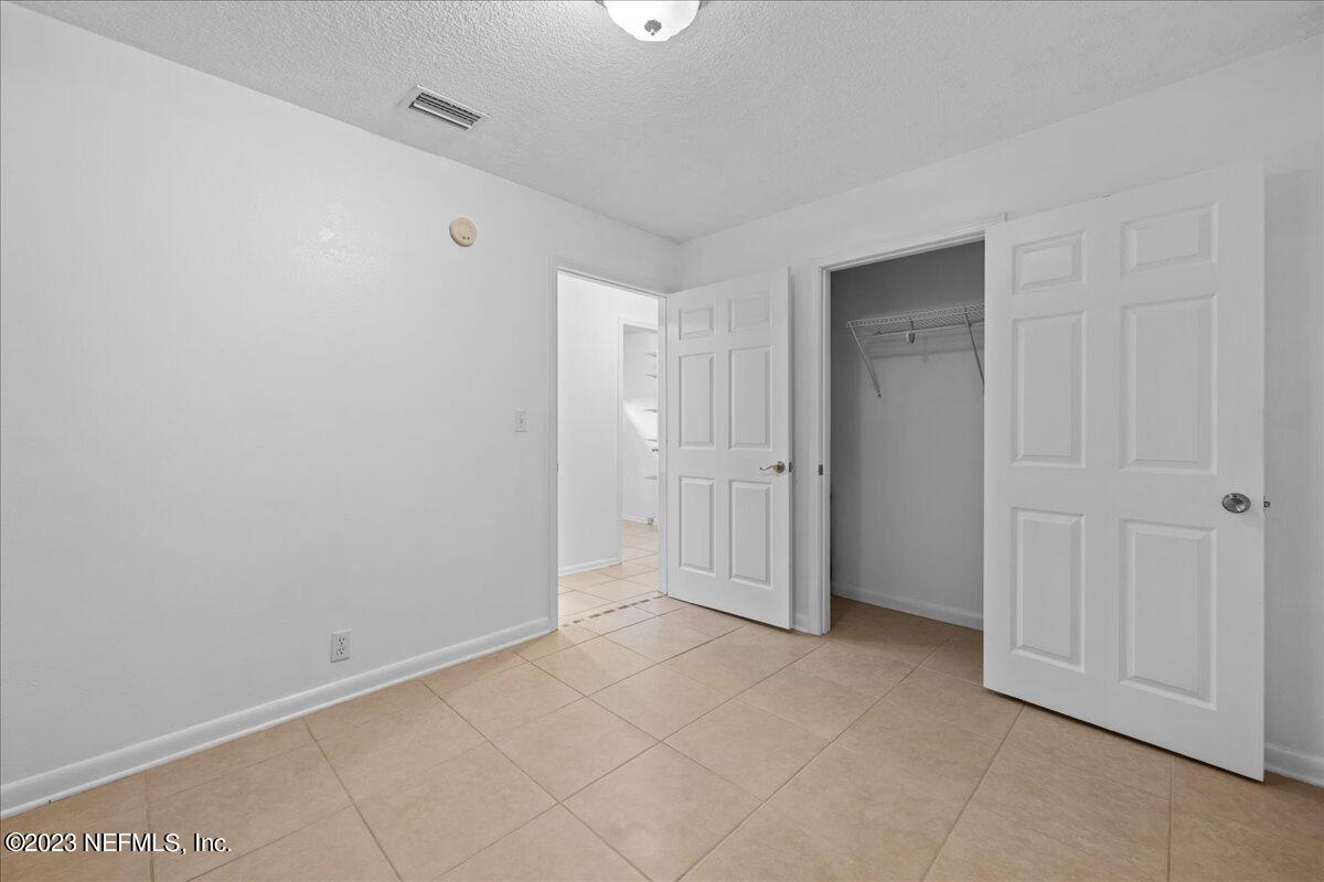 113 Leaf Street San Mateo, FL 32187 - Photo 30 of 32 a view of an empty room