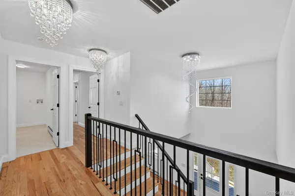 a view of a hallway with entryway