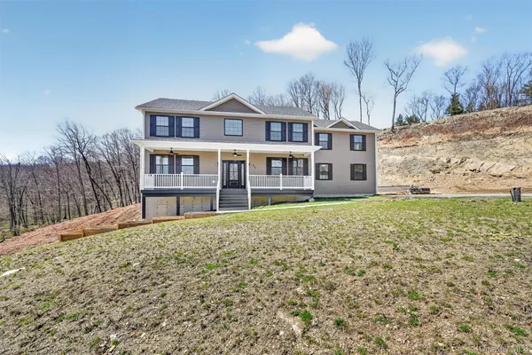 a house view with a garden space