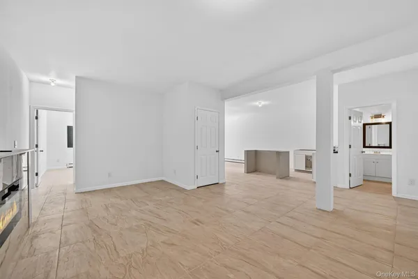 a view of a livingroom with wooden floor