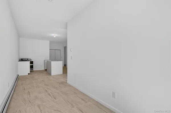 a view of a room with a bench