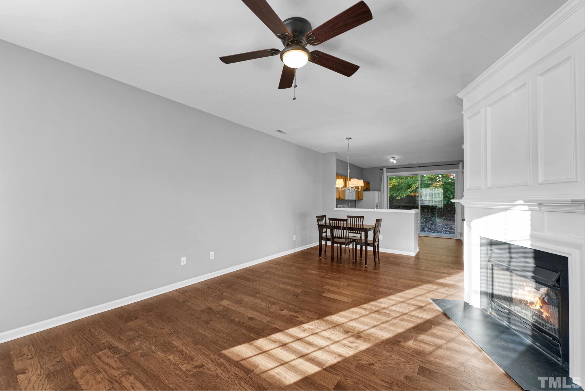 1612 Brook Fern Way Raleigh, NC 27609 - Photo 3 of 14 a living room with furniture and a fireplace