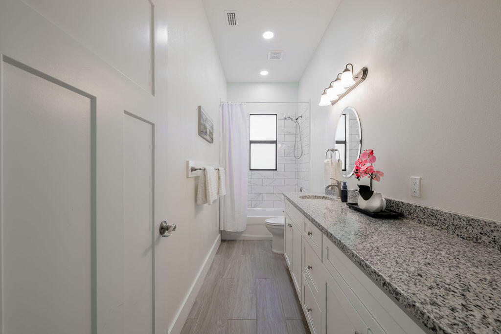 1155 Southwest Bent Pine Cove Port St. Lucie, FL 34986 - Photo 13 of 25 Guest bath