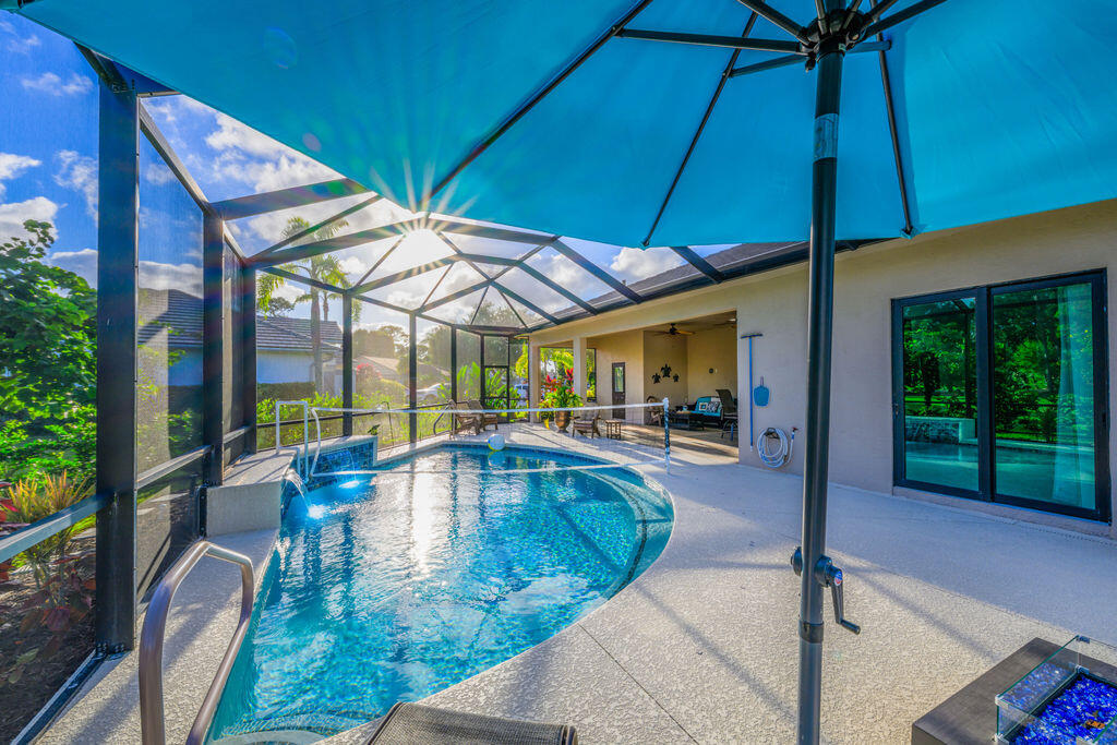1155 Southwest Bent Pine Cove Port St. Lucie, FL 34986 - Photo 19 of 25 Sunlit pool deck