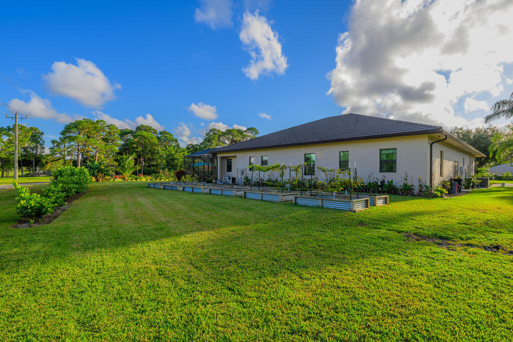 1155 Southwest Bent Pine Cove Port St. Lucie, FL 34986 - Photo 24 of 25 Landscaping and Garden Beds