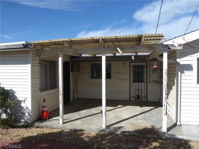 a house view with a outdoor space
