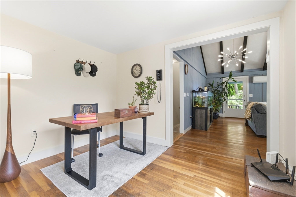 22 Stinson Road Andover, MA 01810 - Photo 21 of 40 a view of a livingroom with furniture and a potted plant