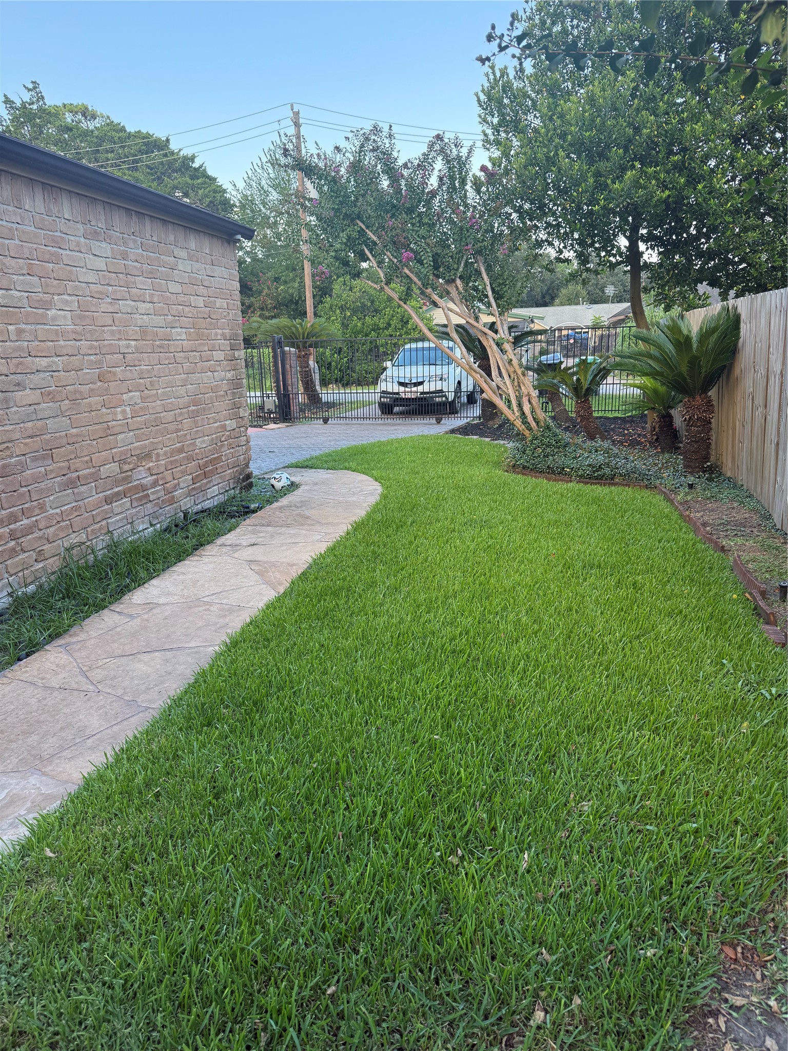 2311 Peppermill Road Houston, TX 77080 - Photo 17 of 18 a view of a garden with a slide