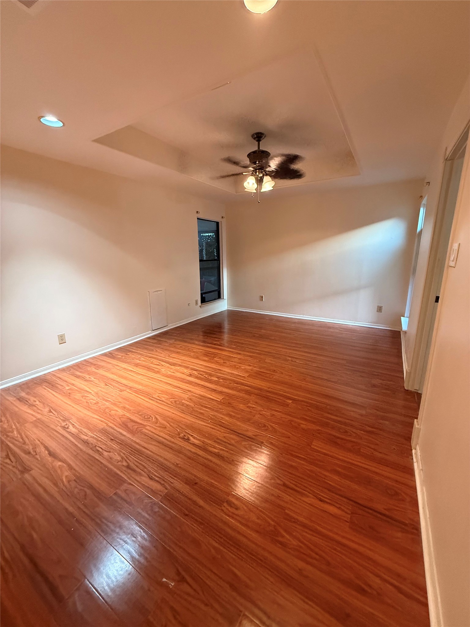 2311 Peppermill Road Houston, TX 77080 - Photo 9 of 18 a view of an empty room with wooden floor