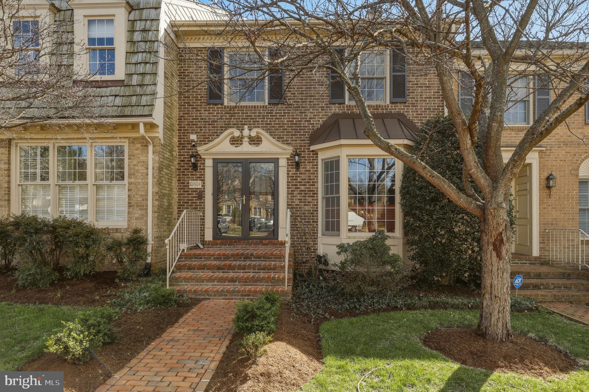 10804 Brewer House Road Rockville, MD 20852 - Photo 3 of 79 a front view of a house with garden