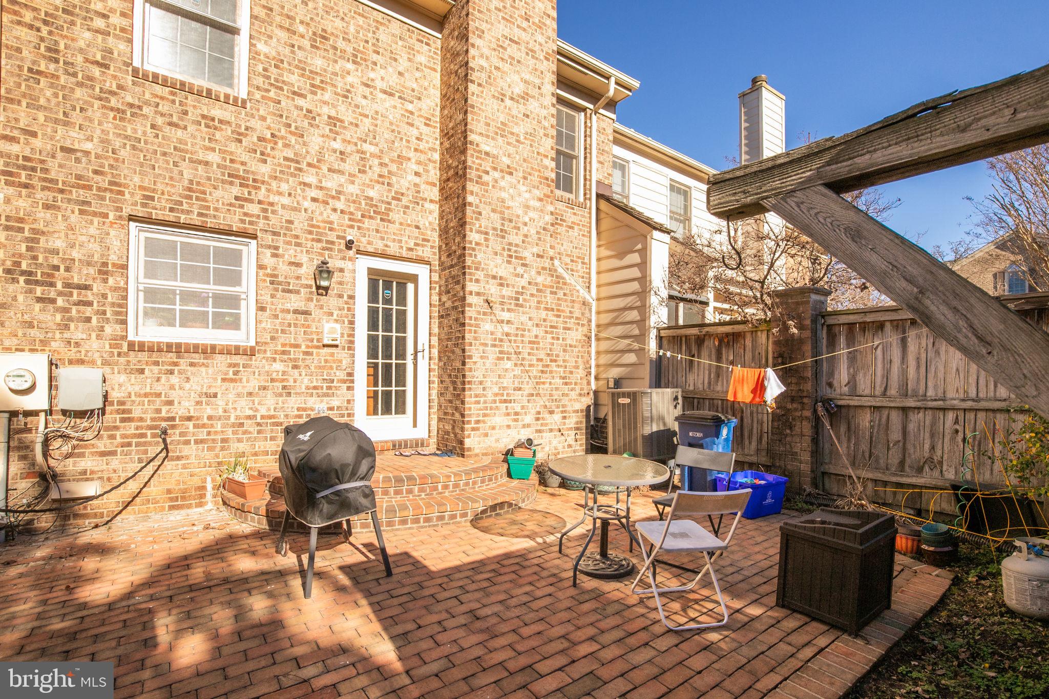 10804 Brewer House Road Rockville, MD 20852 - Photo 35 of 39 a view of a chairs and a table in the patio