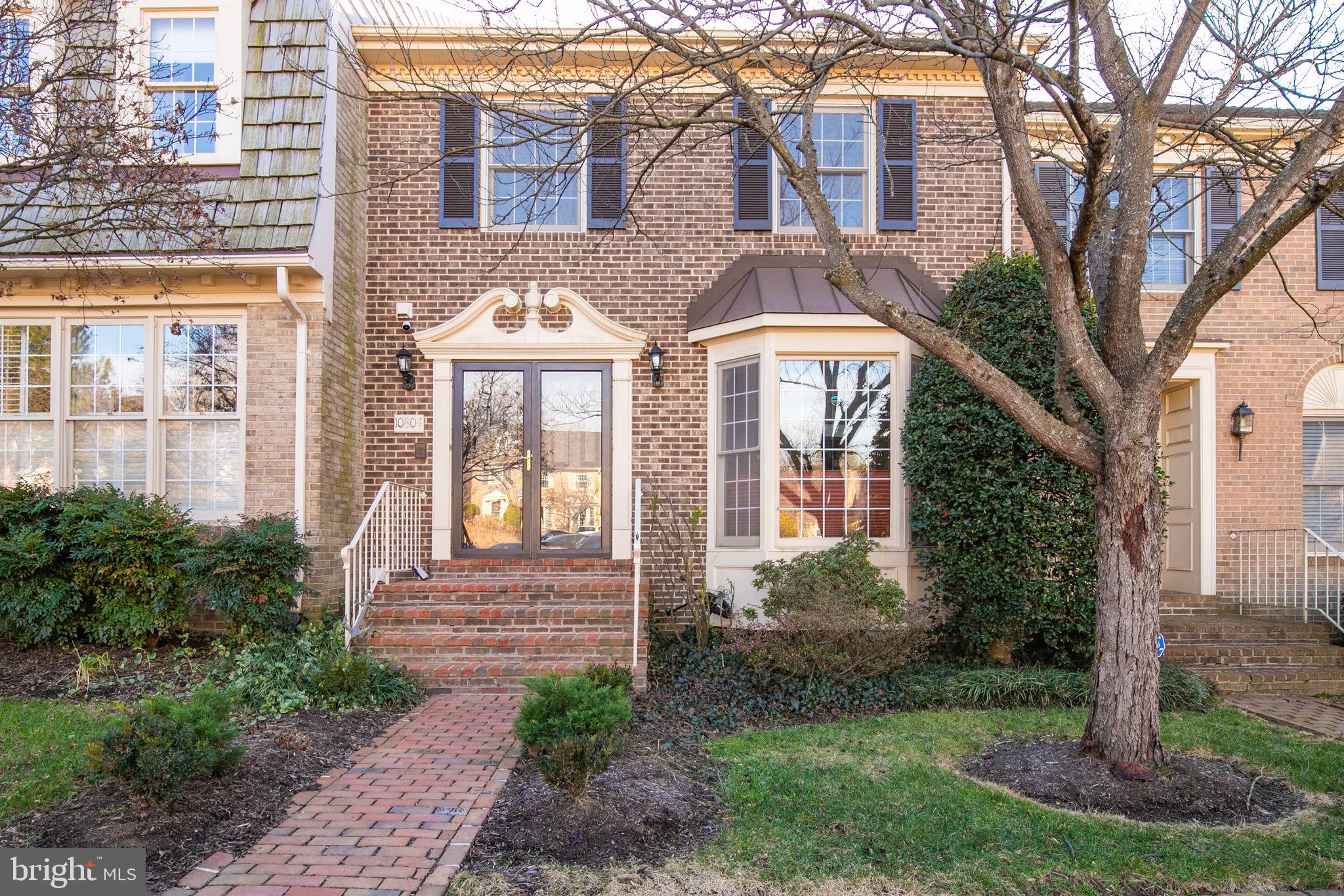 10804 Brewer House Road Rockville, MD 20852 - Photo 67 of 79 a front view of a house with a yard