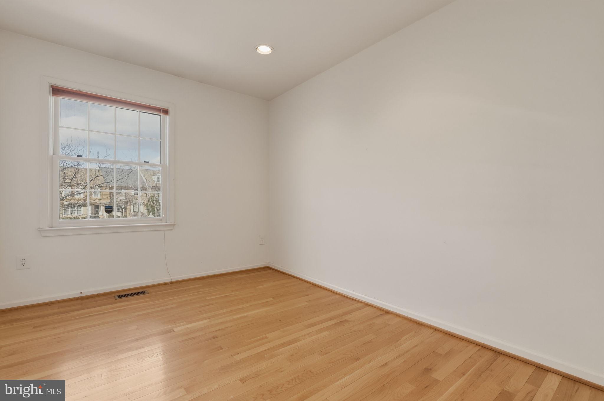 10804 Brewer House Road Rockville, MD 20852 - Photo 68 of 79 wooden floor in an empty room